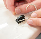 PEEL & STICK FLAT MOUNTABLE FISHING LINE CUTTER IN ACTION